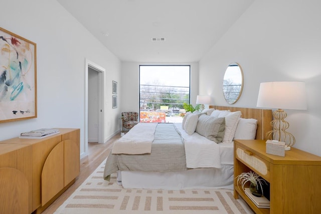 2209 S 1st St Unit 313, Austin, TX 78704 - bedroom featuring light wood-style flooring
