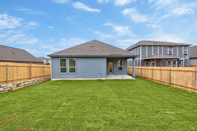 121 Coastal Way, Georgetown, TX 78628 - back of house with a patio and roof with shingles