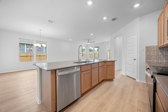 109 Coastal Way, Georgetown, TX 78628 - kitchen with stainless steel dishwasher, a sink, light wood-type flooring, a ceiling fan, and recessed lighting
