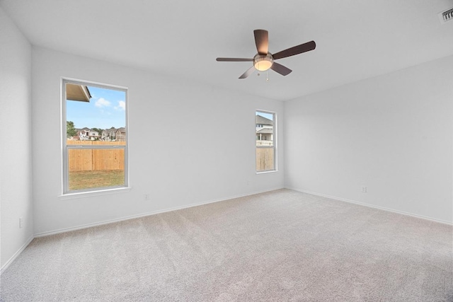 109 Coastal Way, Georgetown, TX 78628 - spare room with plenty of natural light, carpet flooring, ceiling fan, and baseboards