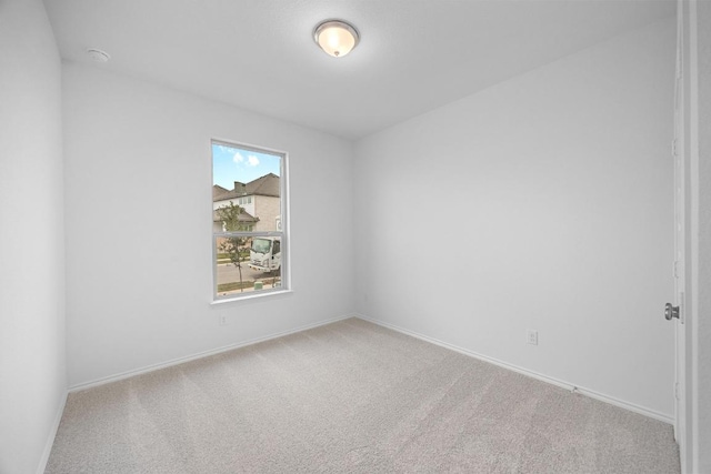 109 Coastal Way, Georgetown, TX 78628 - carpeted spare room featuring baseboards and a smoke detector