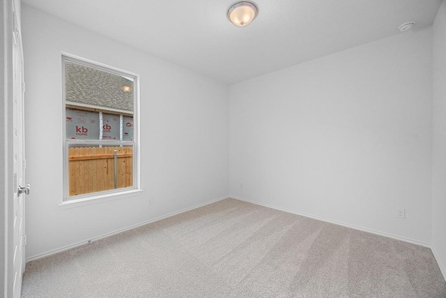 109 Coastal Way, Georgetown, TX 78628 - unfurnished room with carpet flooring, a smoke detector, and baseboards