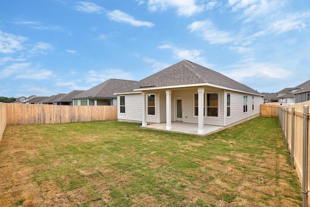 109 Coastal Way, Georgetown, TX 78628 - back of property featuring a patio area and a shingled roof