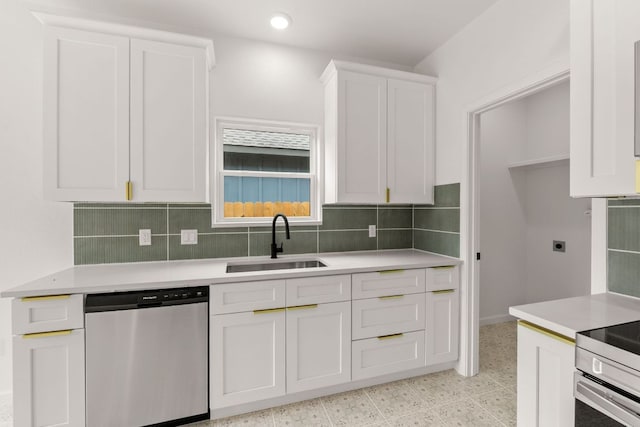 kitchen with white cabinetry, decorative backsplash, a sink, light countertops, and dishwasher