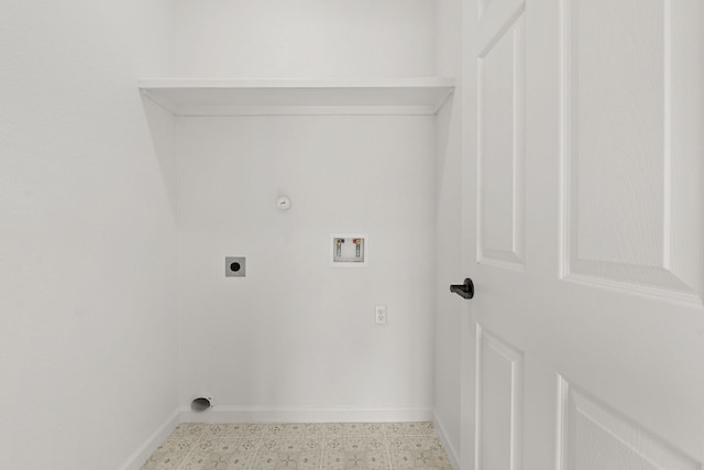 clothes washing area featuring light floors, laundry area, hookup for an electric dryer, washer hookup, and baseboards