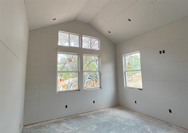 empty room with high vaulted ceiling