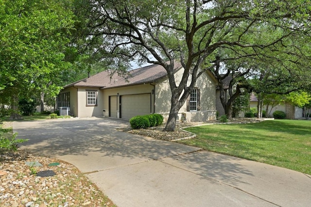 112 Hill Country Dr, Georgetown, TX 78633 - view of front of house featuring stucco siding, an attached garage, driveway, central AC, and a front yard