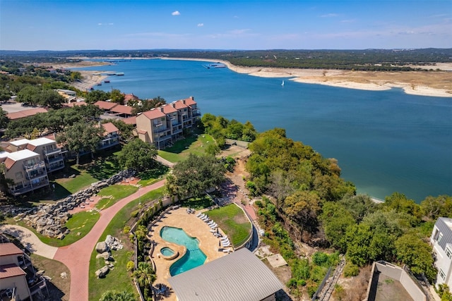 birds eye view of property featuring a water view