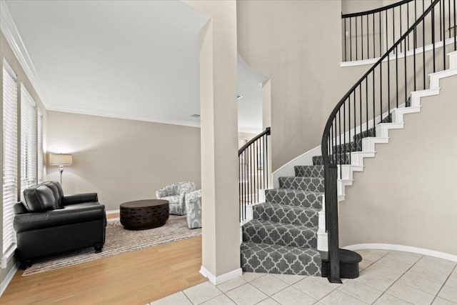 10910 Chestnut Ridge Rd, Austin, TX 78726 - stairs featuring crown molding, baseboards, and wood finished floors