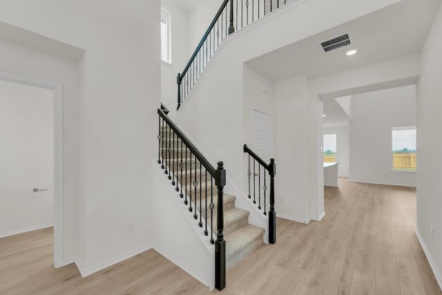 4847 Padula Dr, Round Rock, TX 78665 - stairs featuring wood finished floors and baseboards