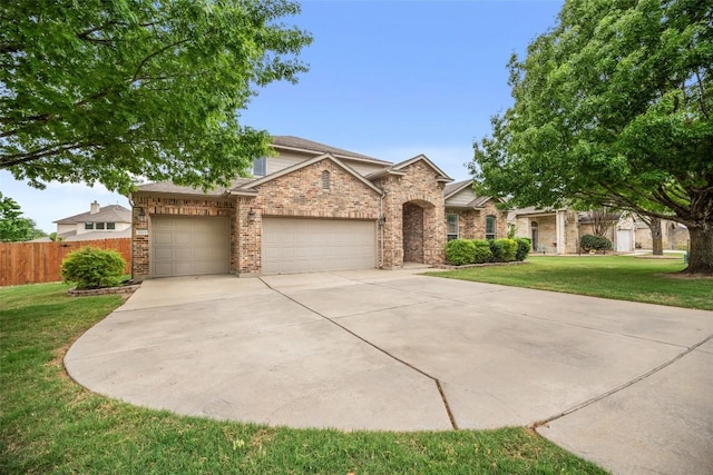 2213 Settlers Park Loop, Round Rock, TX 78665 - view of front of home featuring an attached garage and concrete driveway