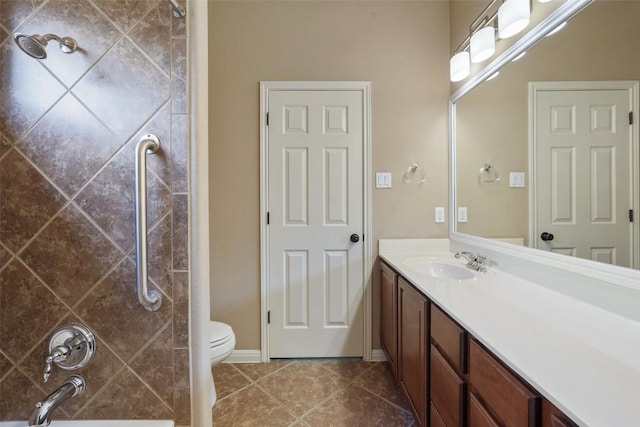 2213 Settlers Park Loop, Round Rock, TX 78665 - bathroom with vanity, tile patterned flooring, and toilet