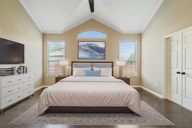 2213 Settlers Park Loop, Round Rock, TX 78665 - bedroom featuring dark wood-style flooring, lofted ceiling, baseboards, multiple windows, and crown molding