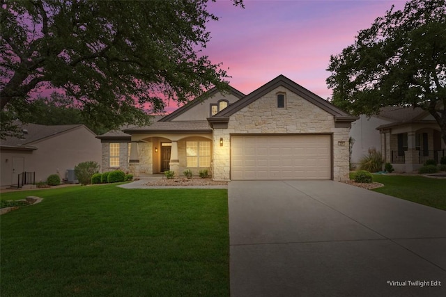 204 San Saba Dr, Georgetown, TX 78633 - ranch-style house featuring a garage, a front yard, driveway, and stone siding