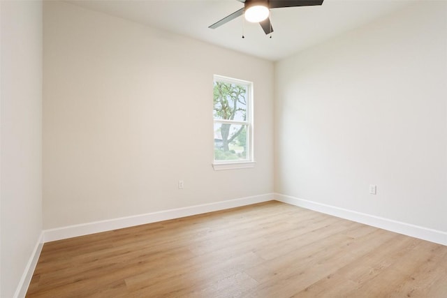 204 San Saba Dr, Georgetown, TX 78633 - spare room featuring light wood-type flooring, a ceiling fan, and baseboards