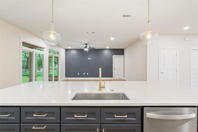204 San Saba Dr, Georgetown, TX 78633 - kitchen featuring a ceiling fan, decorative light fixtures, visible vents, stainless steel dishwasher, and a sink