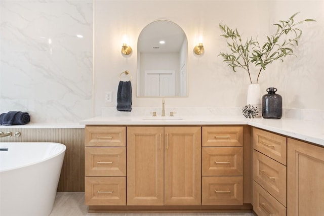 204 San Saba Dr, Georgetown, TX 78633 - full bathroom featuring a freestanding bath and vanity