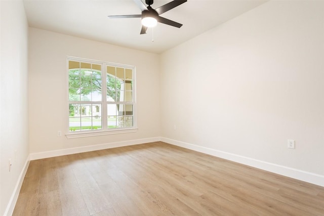 204 San Saba Dr, Georgetown, TX 78633 - spare room with a ceiling fan, baseboards, and light wood finished floors