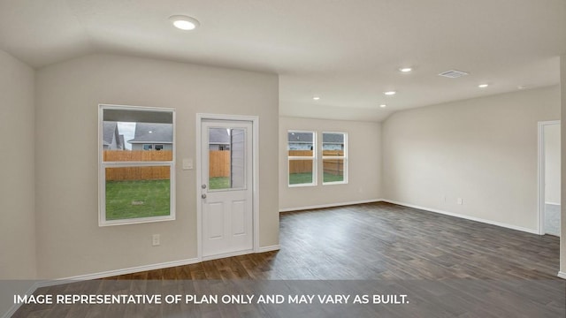 spare room featuring visible vents, dark wood-style floors, baseboards, recessed lighting, and vaulted ceiling