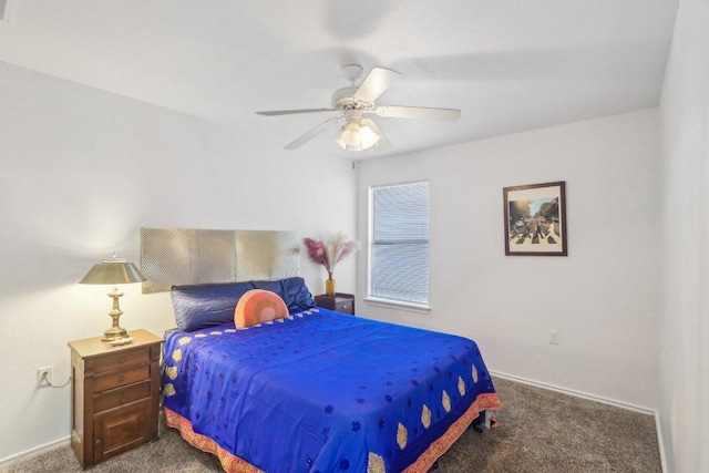 carpeted bedroom with baseboards and a ceiling fan