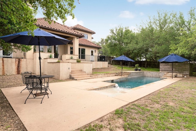 view of swimming pool with a patio, a fenced backyard, and a fenced in pool