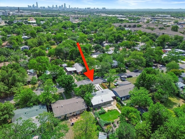 birds eye view of property featuring a view of city