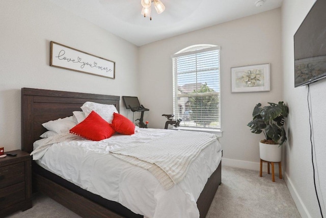 bedroom with multiple windows, carpet flooring, and baseboards