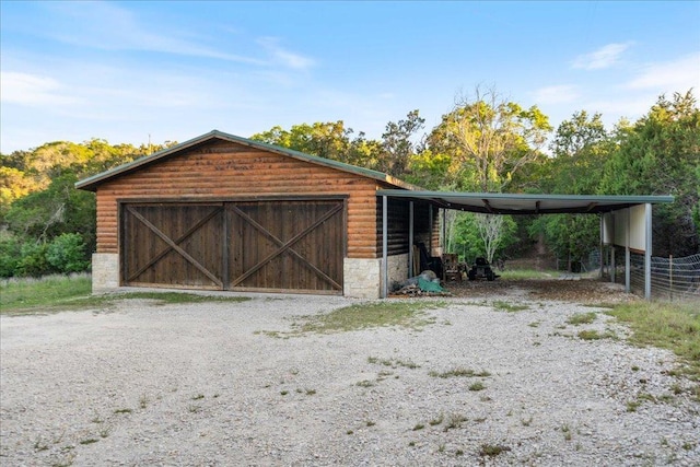 19801 Adrian Way, Jonestown, TX 78645 - garage featuring a garage