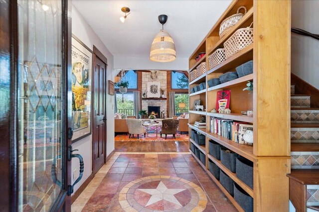 home office with a brick fireplace