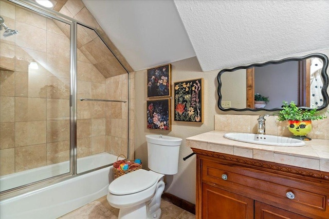 full bath with toilet, combined bath / shower with glass door, lofted ceiling, and vanity