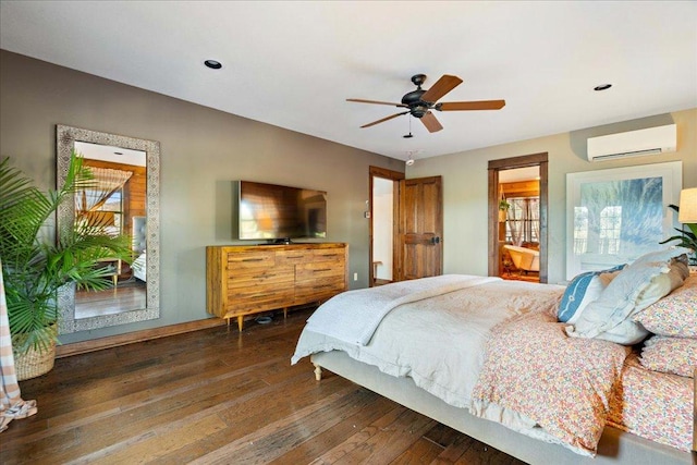 bedroom with baseboards, recessed lighting, a wall mounted AC, and hardwood / wood-style flooring