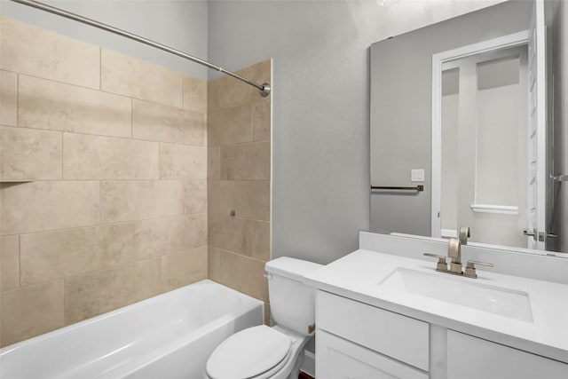 full bath with vanity, toilet, and shower / washtub combination