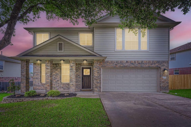 2106 Valerian Trl, Round Rock, TX 78665 - view of front of home with a garage and driveway
