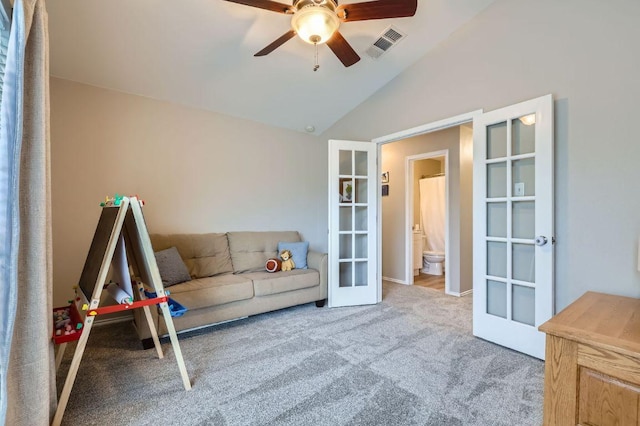 2106 Valerian Trl, Round Rock, TX 78665 - living area with carpet flooring, ceiling fan, french doors, and lofted ceiling