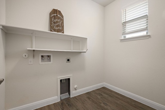 1051 Kenney Fort Xing Unit 73, Round Rock, TX 78665 - laundry room with gas dryer hookup, electric dryer hookup, washer hookup, dark wood finished floors, and baseboards