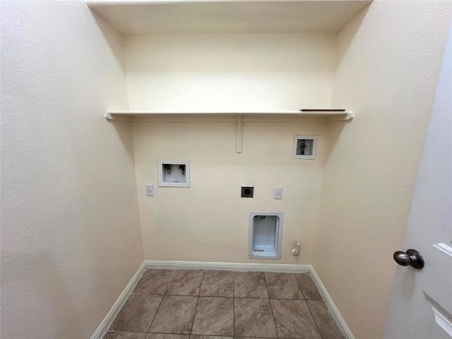 washroom with hookup for a washing machine, electric dryer hookup, laundry area, and baseboards