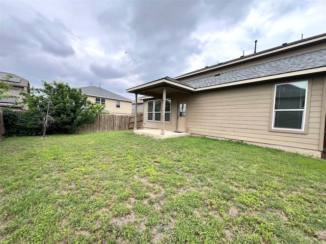 1404 Elbe St, Pflugerville, TX 78660 - back of property with a patio area