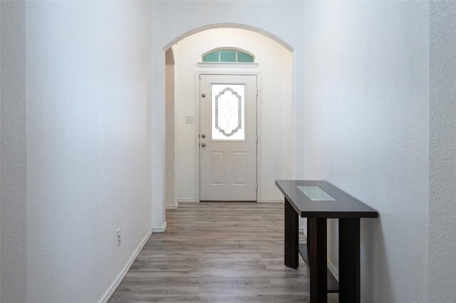 200 Christopher Dr, Killeen, TX 76542 - entrance foyer featuring arched walkways and wood finished floors