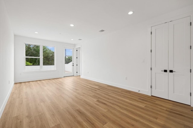 590 Old Mill Rd Unit 113, Cedar Park, TX 78613 - unfurnished room with light wood-type flooring, baseboards, and recessed lighting