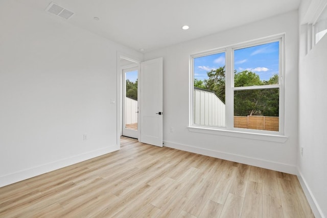 590 Old Mill Rd Unit 113, Cedar Park, TX 78613 - unfurnished room featuring light wood finished floors, baseboards, and recessed lighting