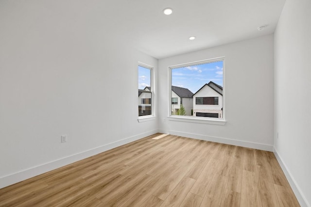 590 Old Mill Rd Unit 113, Cedar Park, TX 78613 - unfurnished room featuring light wood-style flooring, baseboards, and recessed lighting