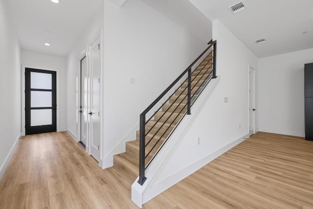 590 Old Mill Rd Unit 113, Cedar Park, TX 78613 - foyer featuring stairway, light wood-style floors, recessed lighting, and baseboards