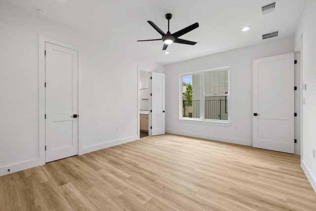 590 Old Mill Rd Unit 113, Cedar Park, TX 78613 - unfurnished bedroom featuring light wood-style flooring, baseboards, recessed lighting, connected bathroom, and ceiling fan