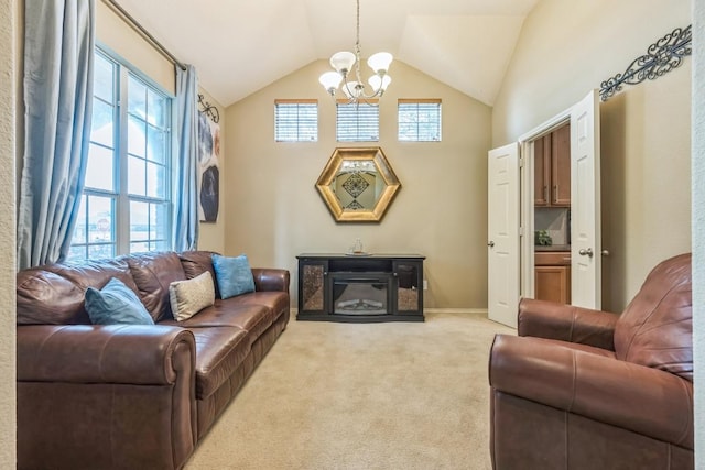 living area with vaulted ceiling, light colored carpet, and a notable chandelier