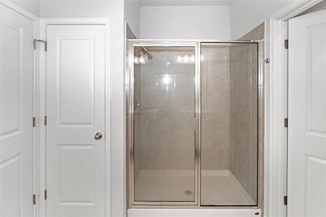 bathroom with a stall shower