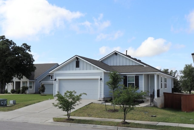 ranch-style home with board and batten siding, driveway, a garage, fence, and a front lawn
