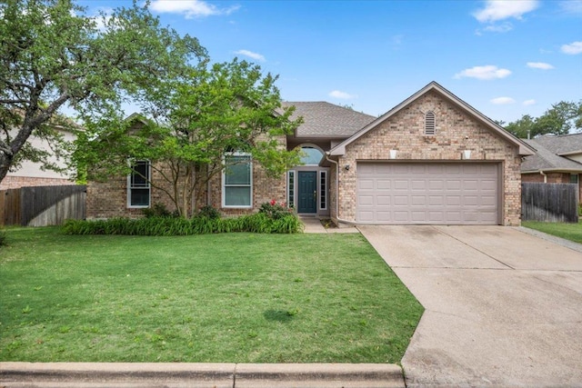 view of front of home featuring fence, a front lawn, brick siding, a garage, and concrete driveway
