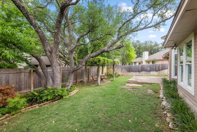 view of yard featuring a fenced backyard