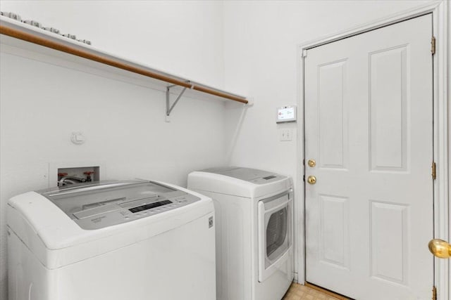 laundry area with laundry area and washing machine and dryer
