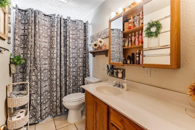 288 Ballard St, Tow, TX 78672 - bathroom featuring a shower with curtain, a textured ceiling, tile patterned floors, vanity, and toilet